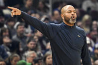 Cleveland Cavaliers coach J.B. Bickerstaff instructs players during the first half of the team's NBA basketball game against the Sacramento Kings, Friday, Dec. 9, 2022, in Cleveland. (AP Photo/Nick Cammett)