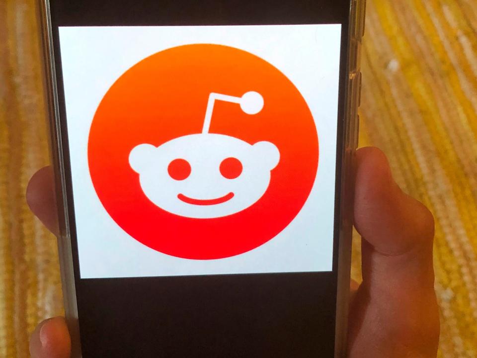 This Monday, June 29, 2020 photo shows the Reddit logo on a mobile device in New York. Reddit, an online comment forum that is one of the internet's most popular websites, on Monday, June 29, 2020 banned a pro-Donald Trump forum as part of a crackdown on hate speech. Reddit banned a total of 2,000 of these forums, or subreddits, most of which it said were inactive or had few users. (AP Photo/Tali Arbel)