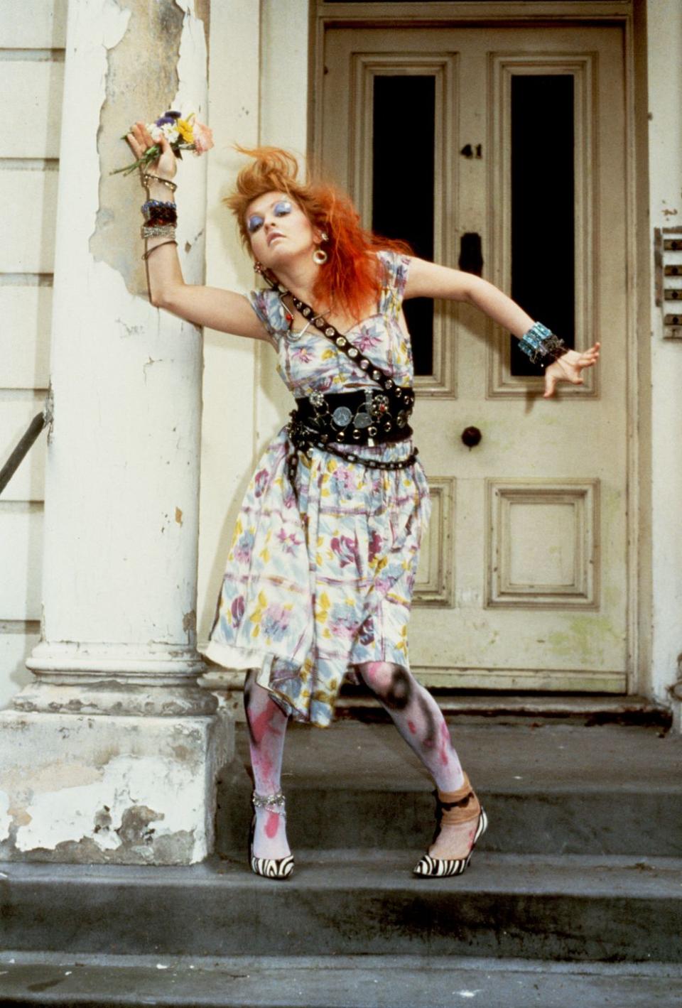 <p>For this photoshoot, Cyndi Lauper took to the streets of London in a dress with an entire art palette of colors.</p>