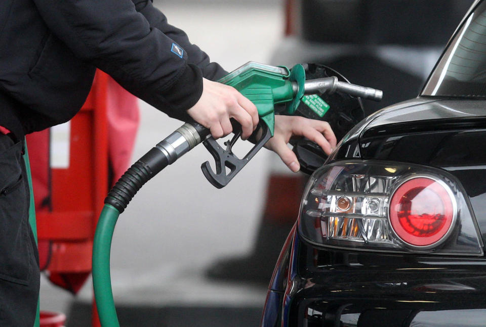 File photo dated 18/03/13 of a generic photo of a person using petrol pump as price rises have led to the pawning of possessions by some desperate drivers anxious to continue motoring, according to an AA/Populus survey.