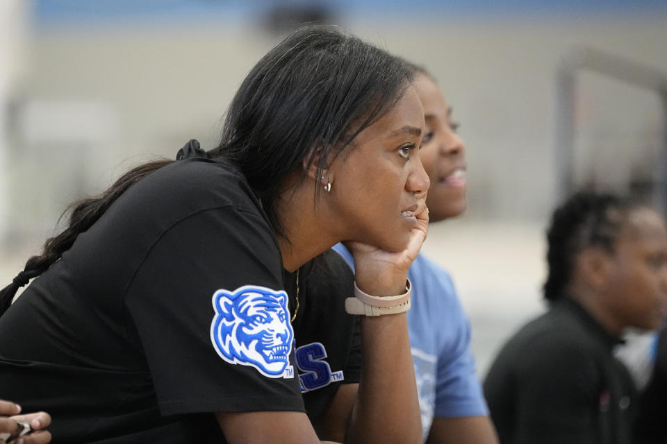 Memphis women's basketball coach Alex Simmons watches high school players during the NCAA College Basketball Academy, Friday, July 28, 2023, in Memphis, Tenn. (AP Photo/George Walker IV)