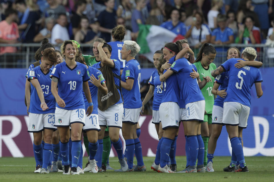 Italy players celebrate at the end of the Women's World Cup round of 16 soccer match between Italy and China at Stade de la Mosson in Montpellier, France, Tuesday, June 25, 2019. Italy won 2-0. (AP Photo/Claude Paris)