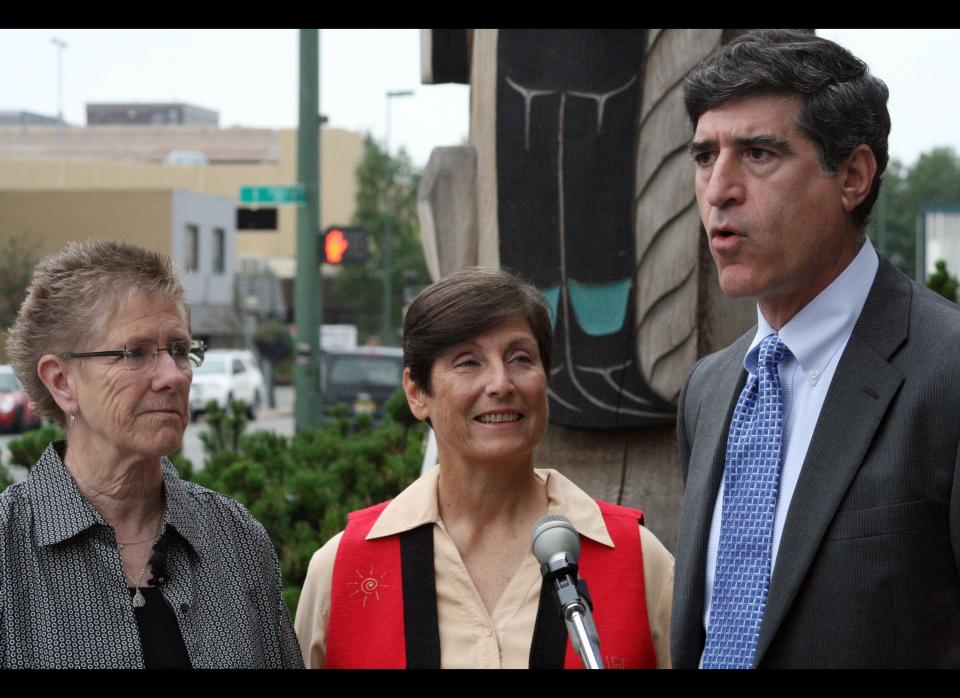 In this Aug. 3, 2010 file photo, Julie Schmidt, left, Gayle Schuh , middle, and Jeffrey Mittman with the American Civil Liberties Union speak at a news conference in Anchorage, Alaska. An Anchorage judge on Monday ruled same Alaska same-sex couples are entitled to the same senior citizen and disabled veteran property tax exemptions as married couples. The ACLU filed the lawsuit against the state of Alaska and the Municipality of Anchorage on behalf of Schmidt and Schuh and two other same sex couples, claiming the state of Alaska's tax assessment rules providing exemptions for senior citizens and disabled veterans discriminate against same sex couples. (AP Photo/Mark Thiessen)