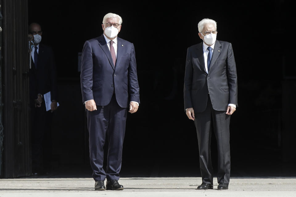 German President Frank-Walter Steinmeier, is flanked by Italian President Sergio Mattarella after visiting the Duomo gothic cathedral, in Milan, Italy, Thursday, Sept. 17, 2020. Steinmeier is scheduled to meet doctors, medical staff and former patients to discuss the coronavirus pandemic and Germany's support to Italy during his two-day visit. (AP Photo/Luca Bruno)