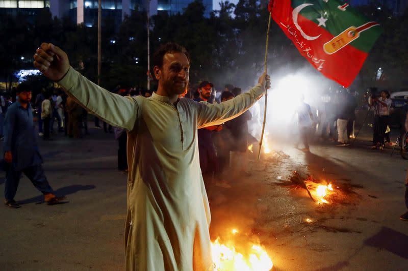 Supporters of Pakistan former Prime Minister Imran Khan, protest following the shooting incident on his long march in Wazirabad, in Karachi,