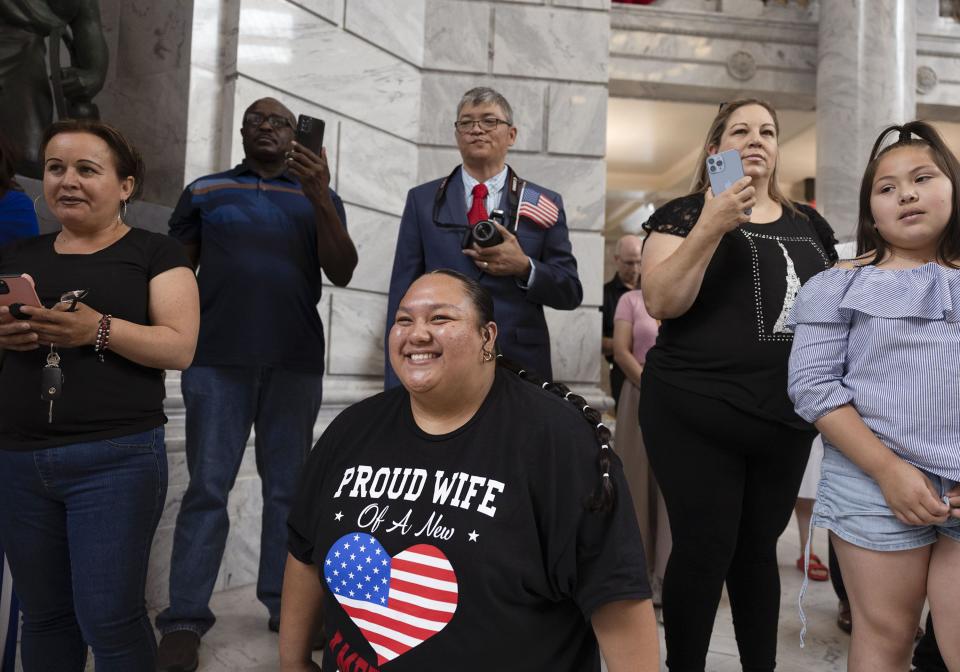 Family members and friends attend a naturalization ceremony at the Capitol in Salt Lake City on Wednesday, June 14, 2023. | Laura Seitz, Deseret News