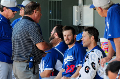 Clayton Kershaw talks with VP of Medical Services Stan Conte during the fourth inning. (USA TODAY Sports)