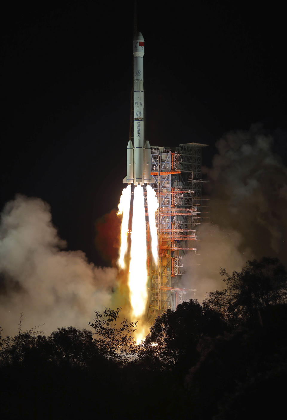 In this photo released by Xinhua News Agency, the Chang'e 4 lunar probe launches from the the Xichang Satellite Launch Center in southwest China's Sichuan Province, Saturday, Dec. 8, 2018. China launched a ground-breaking mission Saturday to soft-land a spacecraft on the largely unexplored far side of the moon, demonstrating its growing ambitions as a space power to rival Russia, the European Union and U.S. (Jiang Hongjing/Xinhua via AP)