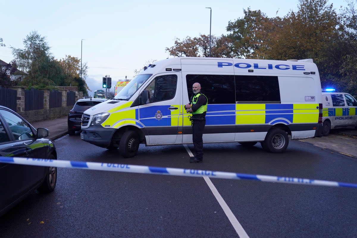 Forensics teams were seen on Tuesday night in Horsforth (PA)