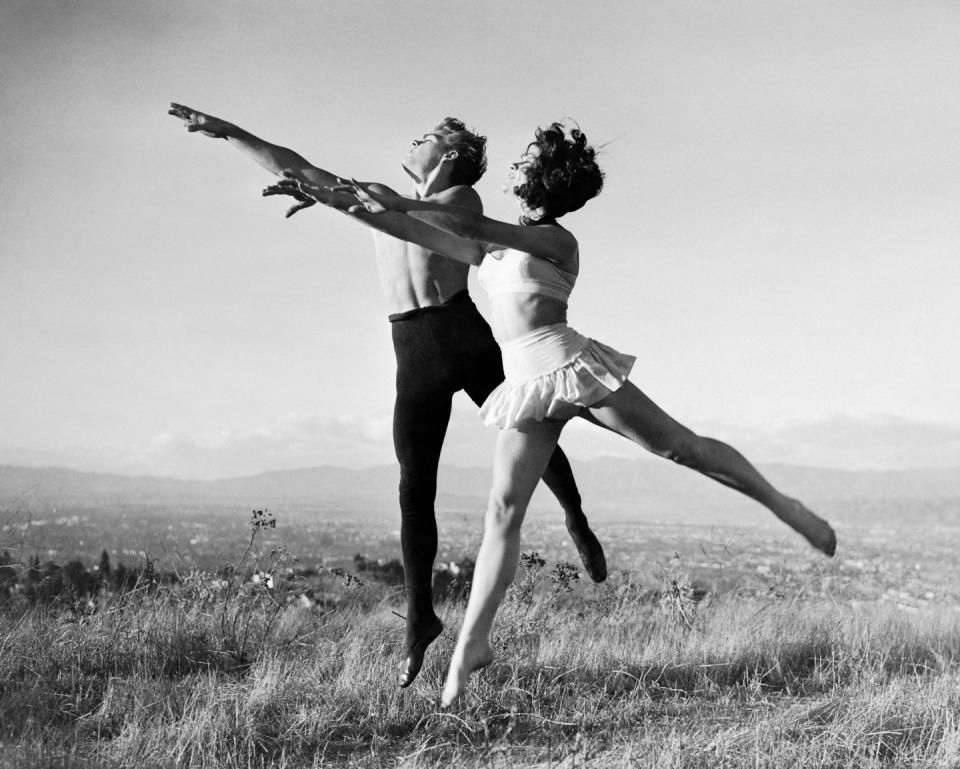 <p>Dean was a skilled dancer and is seen here practicing ballet with a woman in California. The actor had previously taken lessons in New York City. </p>