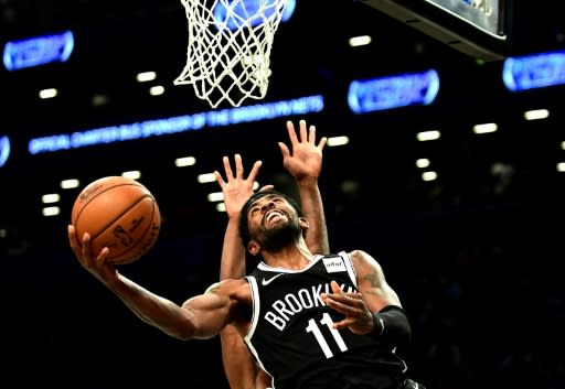 Brooklyn's Kyrie Irving drives for the basket on the way to scoring 50 points in the Nets NBA overtime loss to the Minnesota Timberwolves