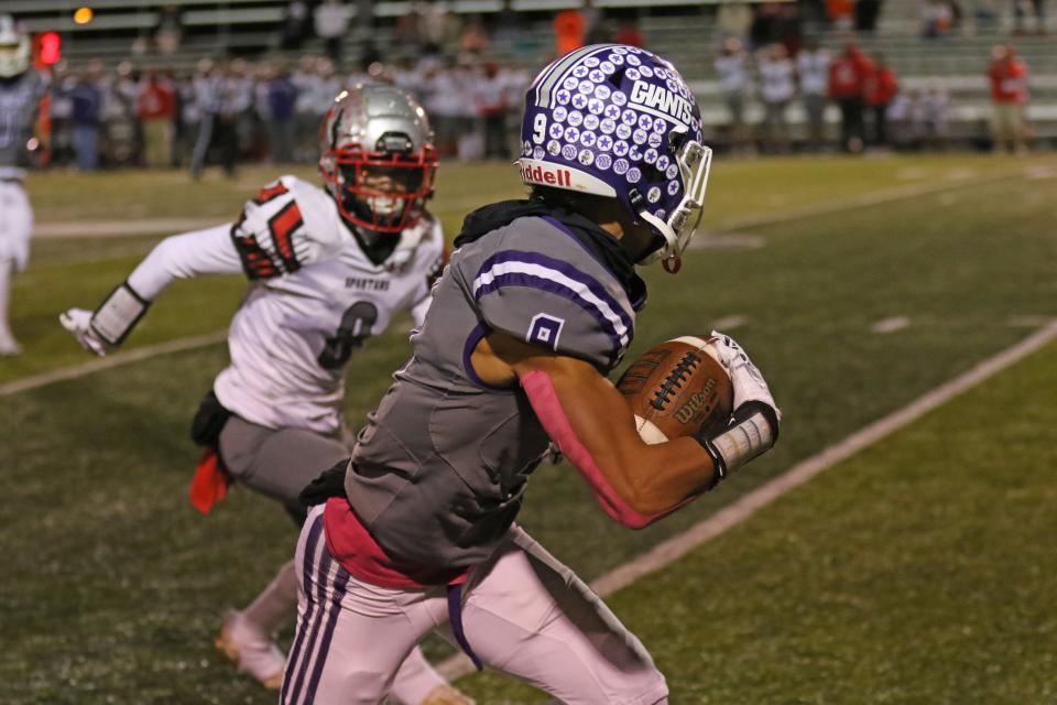 Ross' Bryson Hammer takes off after a catch.