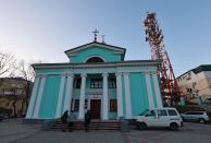 A view shows a communication tower next to an Orthodox church in Vladivostok