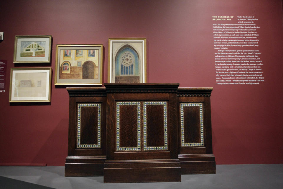 In this Thursday, Oct. 25 2012 photo, the Pulpit from South Presbyterian Church, Syracuse, N.Y., 1907, is on display at the "Louis C. Tiffany and the Art of Devotion" exhibit at the Museum of Biblical Art in New York. (AP Photo/Mary Altaffer)