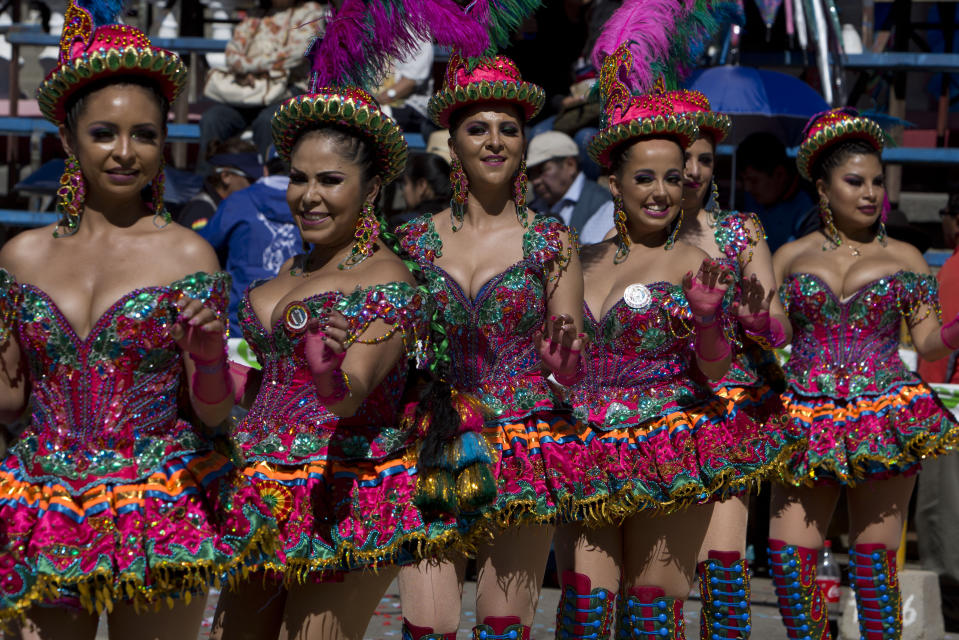 Women perform in the traditional "Morenada" dance during Carnival, in Oruro, Bolivia, Saturday, March 2, 2019. The unique festival features spectacular folk dances, extravagant costumes, beautiful crafts, lively music, and up to 20 hours of continuous partying with lots of tourists, drawing crowds of up people annually. (AP Photo/Juan Karita)