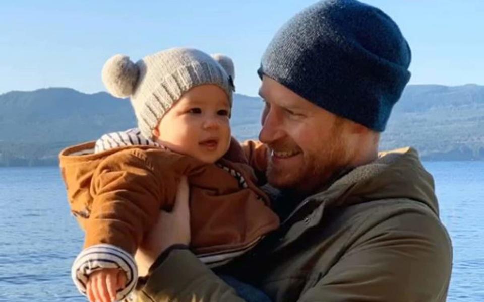 Prince Harry with Archie in Canada, in a picture shared for New Year - Sussex Royal