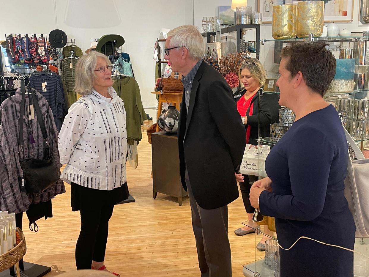 Gov. Tony Evers and Wisconsin Economic Development Corporation Secretary and CEO Missy Hughes visit with Diane Magolan, the owner of Monticello on Jefferson, at her downtown Sturgeon Bay store on Sept. 14.