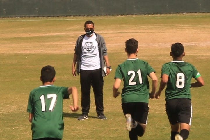 San Luis soccer coach Jesus Rojas, seen with his team in a 2021 photo, when the Sidewinders last advanced to the 6A championship game.