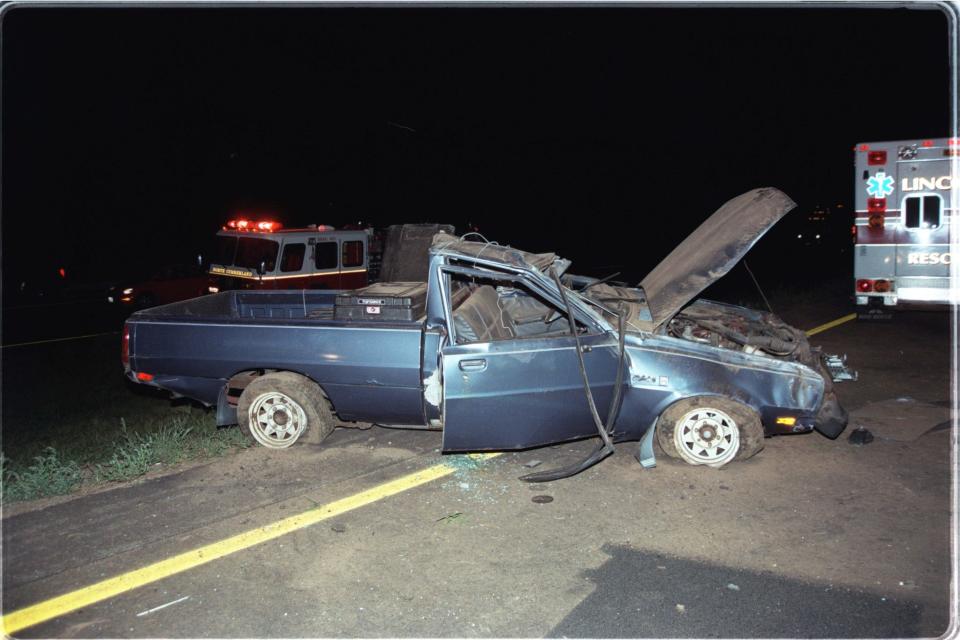 The aftermath of a rollover on Interstate 295 North in Cumberland in September 1999. One of the occupants of the truck was thrown from it and crushed as it rolled over him.