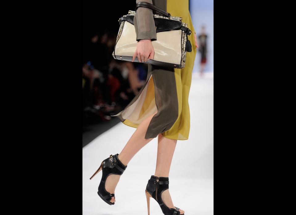 NEW YORK, NY - FEBRUARY 09:  A model walks the runway at the BCBG Max Azria Fall 2012 fashion show during Mercedes-Benz Fashion Week at The Theatre at Lincoln Center on February 9, 2012 in New York City.  (Photo by Jemal Countess/Getty Images)