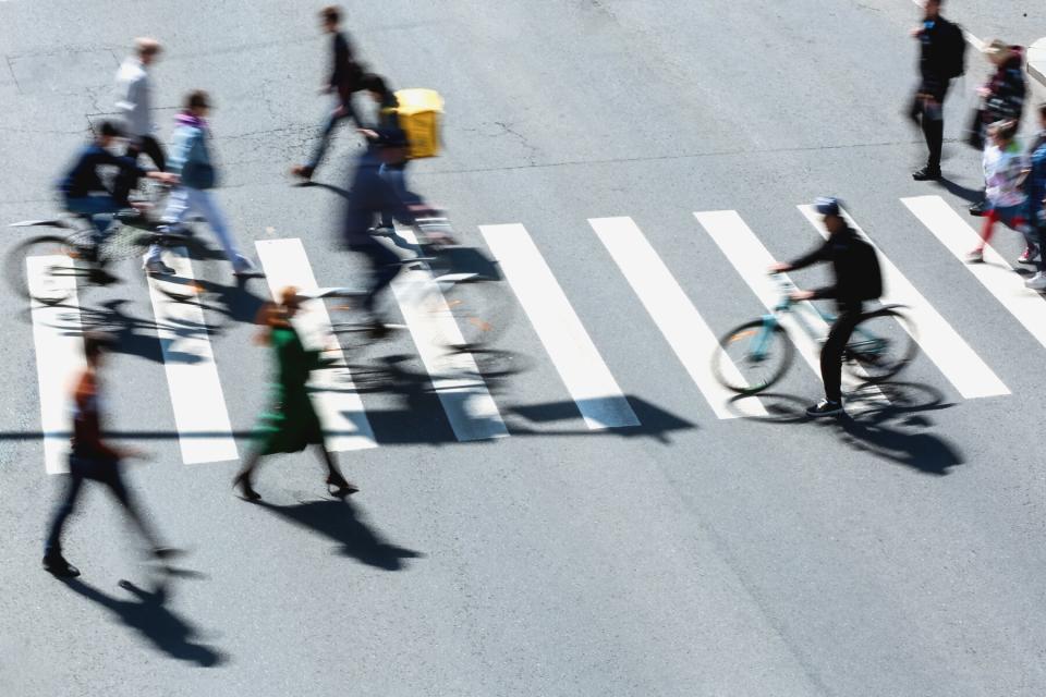 Blurred People Crossing Road, Top View