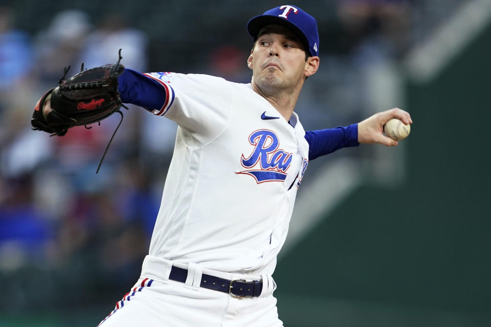 Texas Rangers starting pitcher Cole Ragans throws to an Oakland Athletics batter during the first inning of a baseball game in Arlington, Texas, Tuesday, Sept. 13, 2022. (AP Photo/Tony Gutierrez)