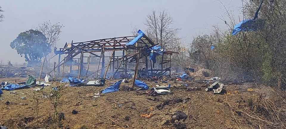 This photo provided by the Kyunhla Activists Group shows aftermath of an airstrike in Pazigyi village in Sagaing Region's Kanbalu Township, Myanmar, Tuesday, April 11, 2023. Witnesses and independent media reports said dozens of villagers in central Myanmar have been killed in an air attack carried out Tuesday by the Southeast Asian country's military government. (Kyunhla Activists Group via AP)