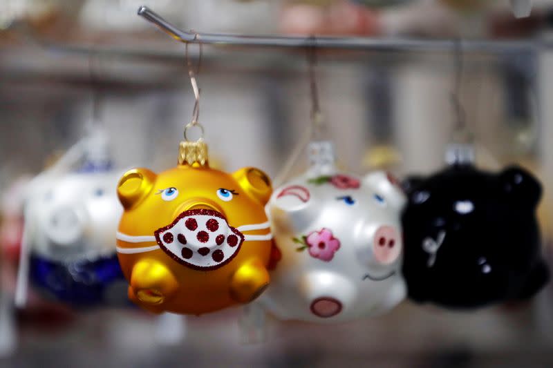 Masked Golden Pig Christmas tree decorations are made in Dvur Kralove nad Labem