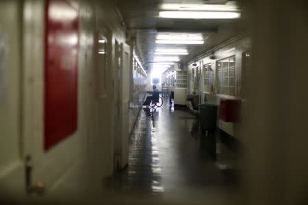 An inmate sits in a wheelchair at the California Medical Facility prison in Vacaville, California, U.S., May 22, 2018. REUTERS/Lucy Nicholson