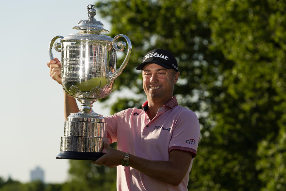 Justin Thomas holds the Wanamaker Trophy after winning the PGA Championship golf tournament in s playoff against Will Zalatoris at Southern Hills Country Club, Sunday, May 22, 2022, in Tulsa, Okla. (AP Photo/Eric Gay)