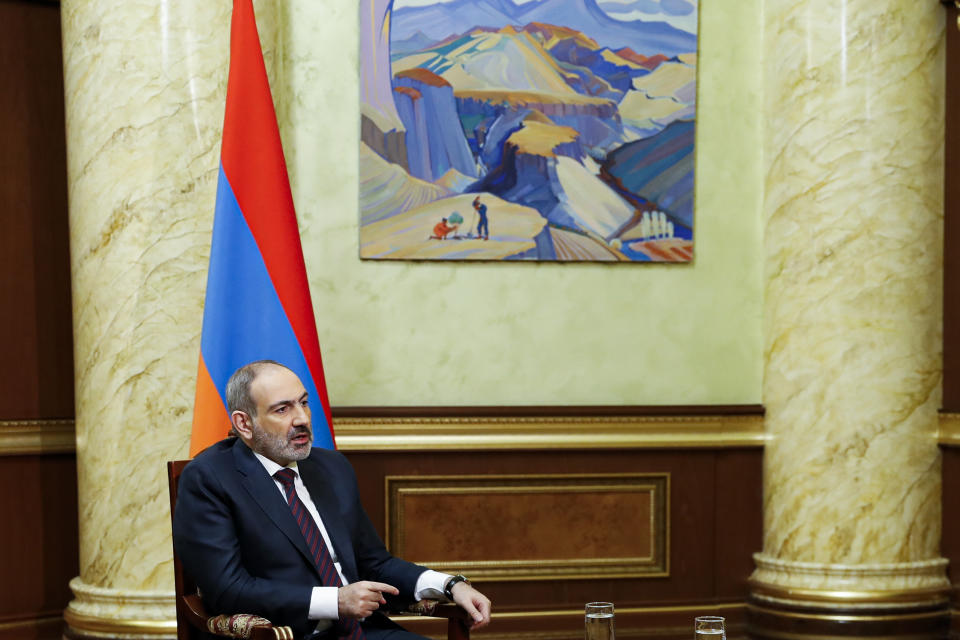 In this photo provided by the Armenian Prime Minister Press Service via PAN Photo, Armenian Prime Minister Nikol Pashinian speaks during his online news conference in Yerevan, Armenia, Monday, Nov. 16, 2020. (Tigran Mehrabyan, Armenian Prime Minister Press Service/PAN Photo via AP)