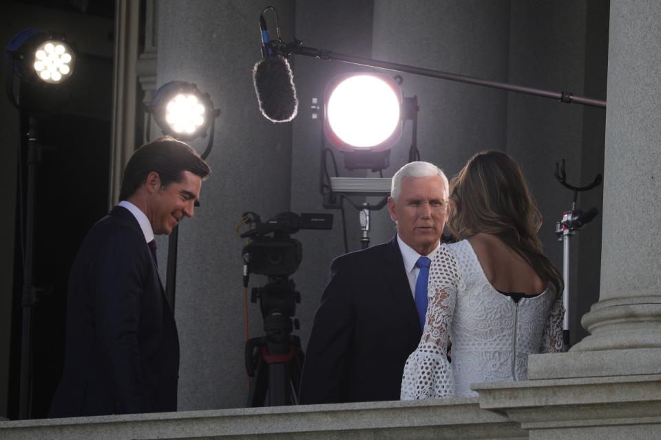 Jesse Watters stands by as Mike Pence greets Emma DiGiovine.