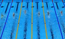 <p>An overview shows swimmers competing in a heat for the women's 200m backstroke swimming event during the Tokyo 2020 Olympic Games at the Tokyo Aquatics Centre in Tokyo on July 29, 2021. (Photo by FranÃ§ois-Xavier MARIT / AFP) (Photo by FRANCOIS-XAVIER MARIT/AFP via Getty Images)</p> 