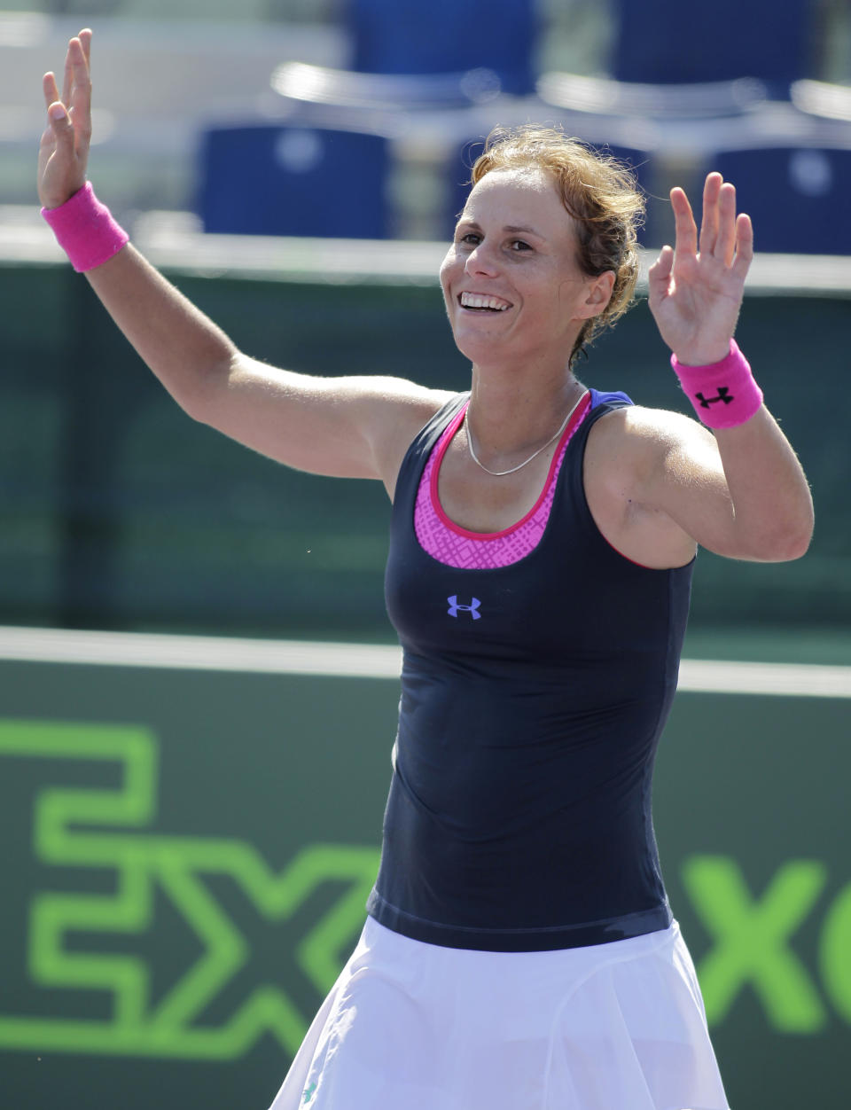 Varvara Lepchenko, of United States, reacts after defeating Jelena Jankovic, of Serbia, 6-3, 2-6, 7-6 (2) during the Sony Open tennis tournament, Friday, March 21, 2014, in Key Biscayne, Fla. (AP Photo/Luis M. Alvarez)