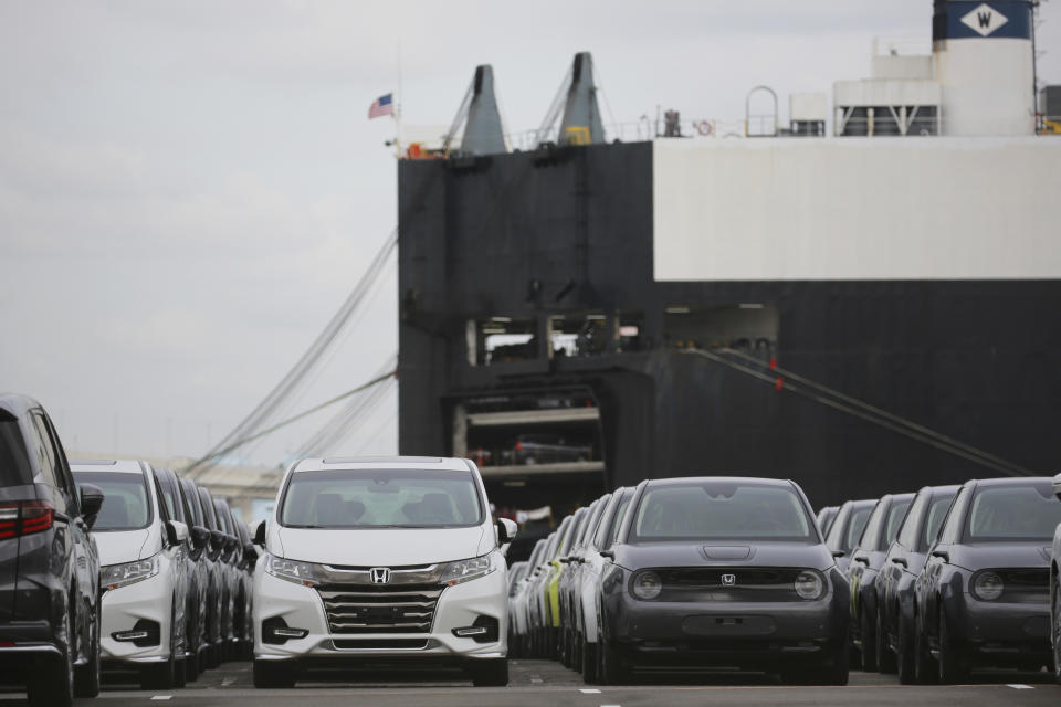 Cars wait to be exported at Yokohama port, near Tokyo on Sept. 29, 2020. Japan marked a trade deficit for the 14th month in a row, government data showed Thursday, Oct. 20, 2022 with exports and imports ballooning to record highs, as the declining value of the yen added to the soaring costs of imported energy, food and other goods. (AP Photo/Koji Sasahara)