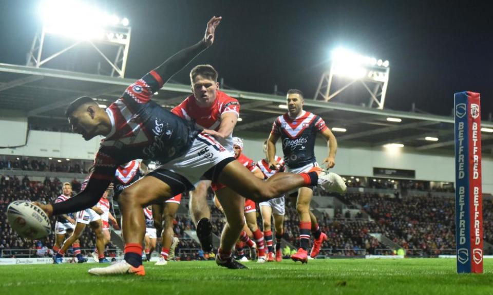 Daniel Tupou scores the first Sydney Roosters try against St Helens.