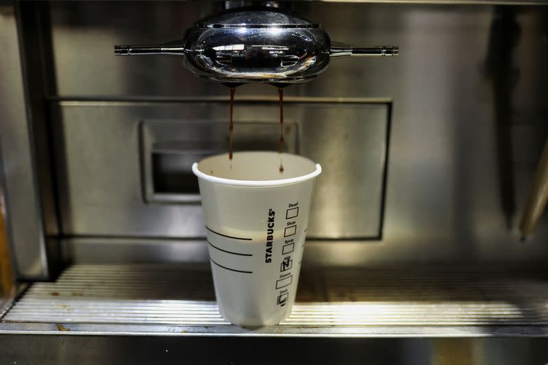 A view shows a paper cup at a Starbucks' outlet at a market in New Delhi