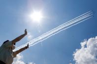 Japan Air Self-Defense Force stages a flyover to salute the medical workers at the frontline of the fight against the coronavirus disease (COVID-19), in Tokyo