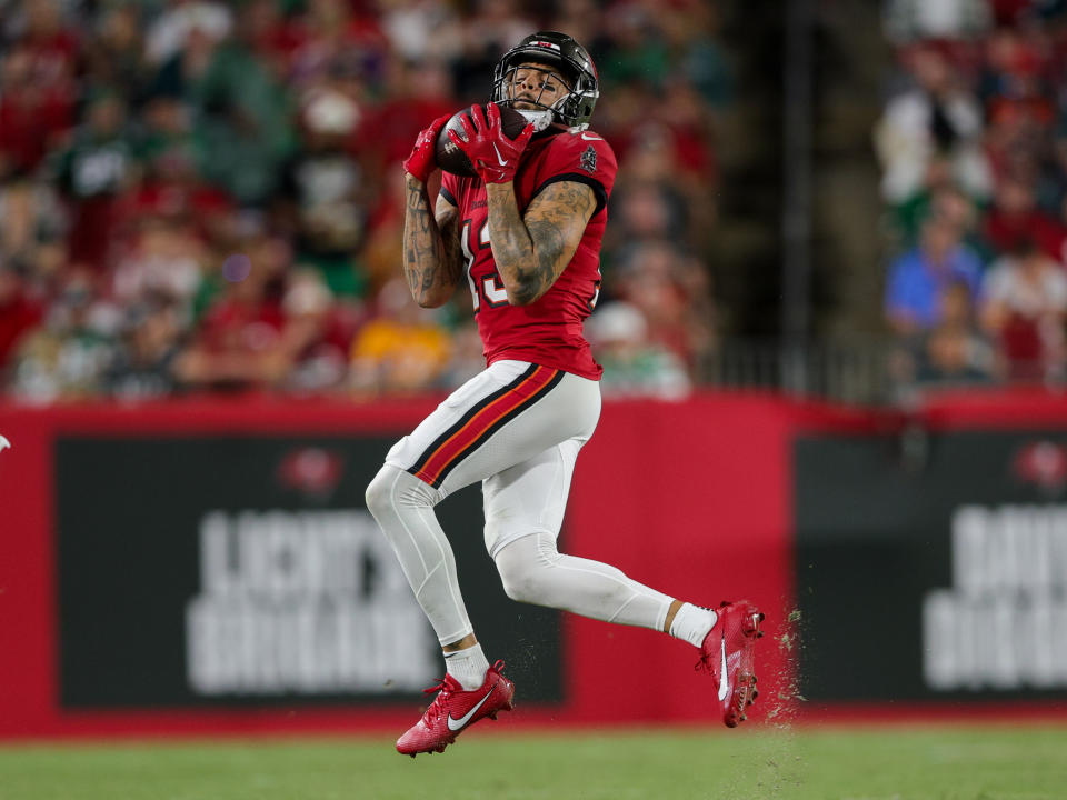 Sep 25, 2023; Tampa, Florida, USA; Tampa Bay Buccaneers wide receiver Mike Evans (13) catches a pass against the Philadelphia Eagles in the fourth quarter at Raymond James Stadium. Mandatory Credit: Nathan Ray Seebeck-USA TODAY Sports