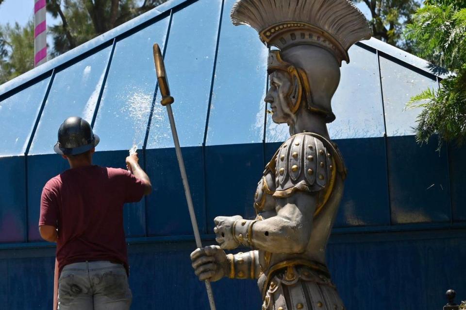 Workers clean Playland Fresno in Roeding Park as it prepares for this weekend’s Summer Jam 2024 Thursday morning, June 20, 2024 in Fresno.