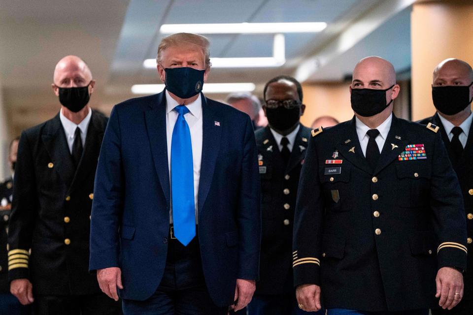 President Donald Trump wears a mask as he visits Walter Reed National Military Medical Center in Bethesda, Md. on July 11, 2020. 