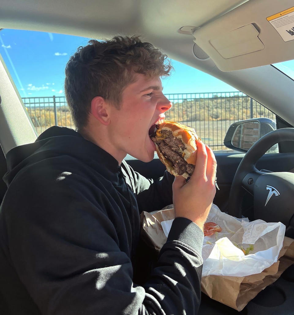 During his 50-state series, Winkler stopped at the restaurant Big A** Burgers in New Mexico. Pictured above is him eating its two-pound burger.  (Courtesy Tommy Winkler)