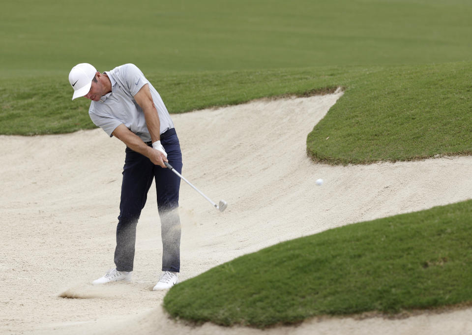 Britain's Paul Casey plays from a bunker on the 5th hole during the second round of the Australian Open golf tournament in Sydney, Friday, Dec. 6, 2019. (AP Photo/Rick Rycroft)