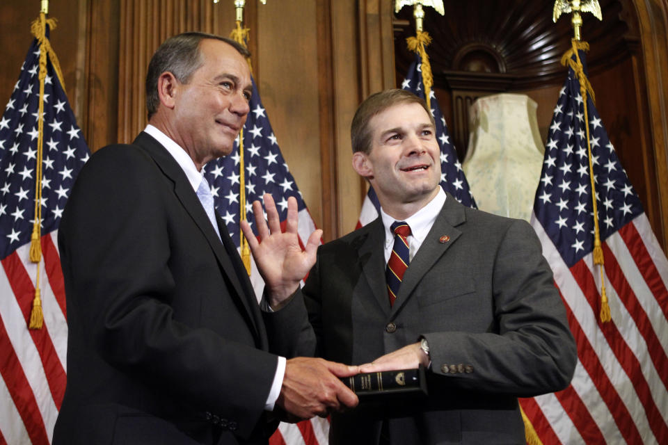 FILE - House Speaker John Boehner of Ohio participates in a ceremonial swearing in with Rep. Jim Jordan, R-Ohio, on Capitol Hill in Washington, Wednesday, Jan. 5, 2011. (AP Photo/Jacquelyn Martin, File)
