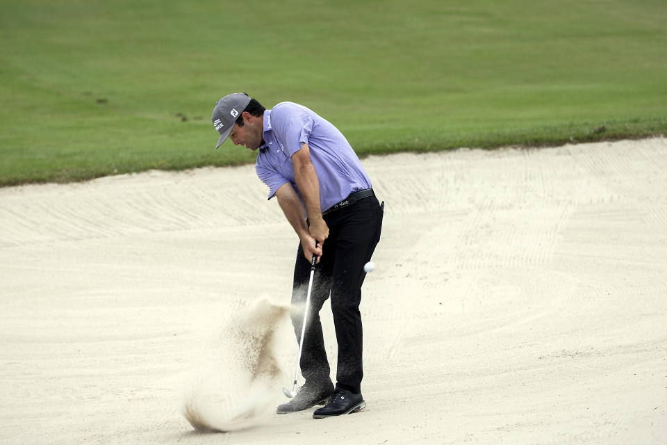 Robert Streb hits out of the bunker on the 10th fairway during the final round of the RSM Classic golf tournament, Sunday, Nov. 22, 2020, in St. Simons Island, Ga. (AP Photo/Stephen B. Morton)