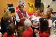 Virginia Republican gubernatorial candidate Glenn Youngkin greets a supporter during a meet and greet at a sports bar in Chesapeake, Va., Monday, Oct. 11, 2021. Youngkin faces former Governor Terry McAuliffe in the November election. (AP Photo/Steve Helber)