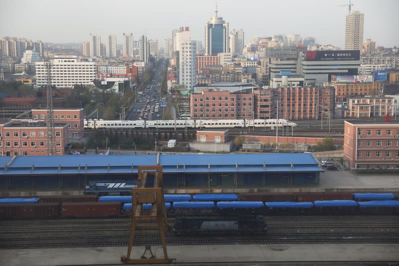 Freight cars are seen at a train station in Dandong