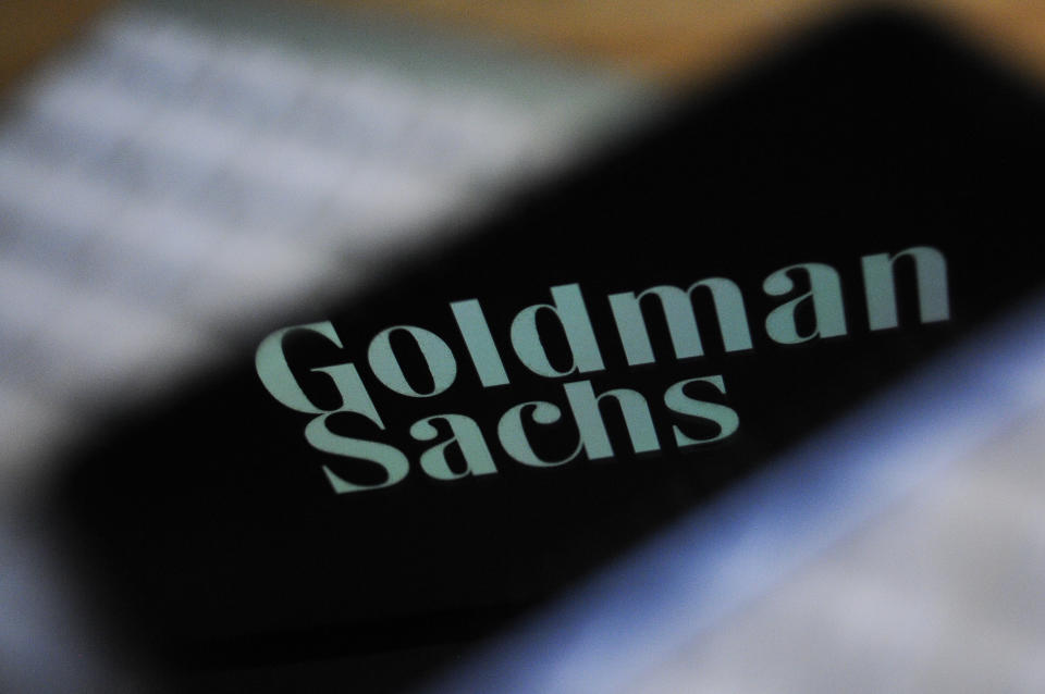 The Goldman Sachs bank logo is seen reflected on the screen of a mobile phone in this photo illustration on November 15, 2017. (Photo by Jaap Arriens/Sipa USA)