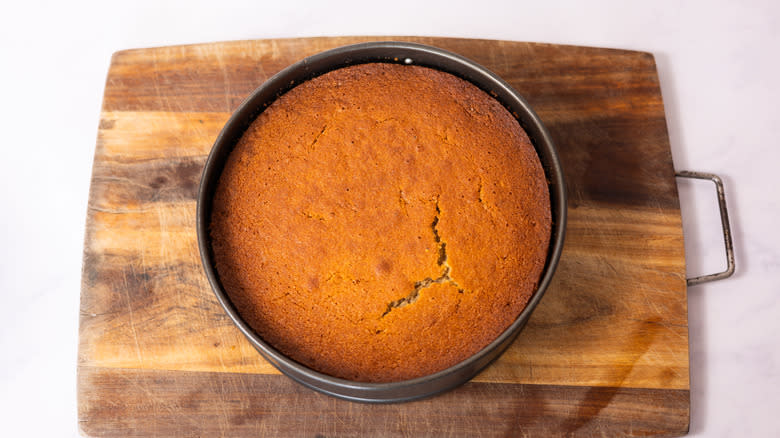 golden brown cake in cake pan 