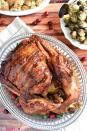 <p><span>Add fresh cranberries to dress it up for Christmas.</span></p><p>Get the recipe from <a href="https://www.fivehearthome.com/maple-glazed-turkey-with-bacon-and-sage-butter/" rel="nofollow noopener" target="_blank" data-ylk="slk:Five Heart Home;elm:context_link;itc:0;sec:content-canvas" class="link ">Five Heart Home</a>. </p>